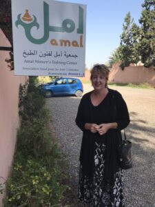 Suzi outside the AMAL Center